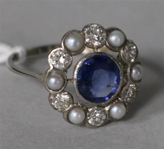 An 18ct white gold and platinum, sapphire, diamond and split pearl cluster ring, size M.